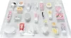 A collection of small beauty and skincare items arranged in a clear plastic tray. Produktbild-Vorschau