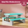 A child's picnic table set in a room with pink walls and wooden flooring. Anteprima dell’immagine prodotto