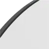 A close-up view of the edge of a mirror with a black frame. Produktbild-Vorschau