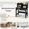 A collage of images showcasing a black desk with a laptop, books, and accessories, alongside lifestyle shots of the desk in different room settings (living room, study, office). Produktbild-Vorschau