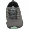 A close-up, front view of a gray sneaker with green accents. Produktbild-Vorschau