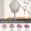 A makeup mirror with multiple magnification views shown below. Produktbild-Vorschau