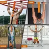 Collage of four images showing a resistance band for pull-ups being used in different settings: outdoors on a monkey bar, indoors on a door frame, outdoors on a pull-up bar, and in a gym. Anteprima dell’immagine prodotto