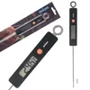 A collage of images showing a digital thermometer with a probe, presented in packaging and also shown individually. Produktbild-Vorschau