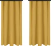 Two yellow curtains hanging against a white background. Náhled obrázku produktu