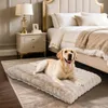A dog is lying on a dog bed in a bedroom. Anteprima dell’immagine prodotto