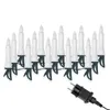 A string of LED candle lights and a power plug against a white background. Produktbild-Vorschau