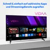 A modern flat-screen television displaying a smart TV interface with various app icons and recommended content. Produktbild-Vorschau