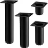 Four black metal furniture legs are arranged on a white background. Two legs are positioned vertically on the left, one taller than the other. Two more legs are positioned in the upper right and lower right corners, appearing shorter and angled. Produktbild-Vorschau