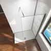A modern shower enclosure with a glass wall and a white shower tray, set against a white wall and a window with a view. Produktbild-Vorschau