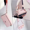 A collage of images showing a pink faux leather phone case with a wrist strap and a shoulder strap, designed to be worn as a small bag. Produktbild-Vorschau