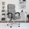 A grey fabric office chair with a footrest is shown in a room with shelves and a desk.
