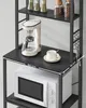 A kitchen shelf unit with various items, including a coffee maker, mug, and microwave. Náhled obrázku produktu
