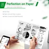 A person is holding a document with charts and graphs, and a smartphone with similar graphics, in front of a white background with some green accents. Produktbild-Vorschau