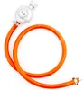 A gas regulator with an orange hose, isolated on a white background. Náhled obrázku produktu