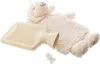 A beige hot water bottle with a fluffy white sheep cover and a separate stopper lies on a white background. Podgląd zdjęcia produktu