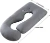 A grey U-shaped pillow with white stripes, with dimensions indicated by text overlays. Náhled obrázku produktu