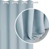 A close-up view of a light blue curtain, showing its texture and how it drapes. Produktbild-Vorschau