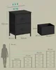 A diagram showing the dimensions of a black fabric dresser with multiple drawers, alongside a silhouette of a person for scale and other dresser configurations. Produktbild-Vorschau