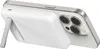 A white power bank with a silver kickstand is attached to the back of a silver smartphone, showing the camera array of the phone. Voir les images du produit