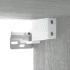 A close-up view of a white cabinet hinge mechanism attached to a wooden surface. Anteprima dell’immagine prodotto