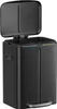 A black dual-compartment kitchen trash can with its lid open. Produktbild-Vorschau