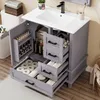 A bathroom vanity with the doors and drawers open, showing storage compartments. Anteprima dell’immagine prodotto
