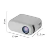 A mini projector with dimensions indicated by lines and text. Voir les images du produit