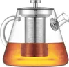 A glass teapot with a metal infuser and tea inside, presented on a white background. Produktbild-Vorschau