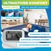 An advertisement for an inflatable mattress with text overlays highlighting its features and benefits. A man is sleeping on the mattress in the foreground, with a living room scene in the background. Produktbild-Vorschau