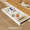 An open drawer of a desk, showing its contents and dimensions. Produktbild-Vorschau