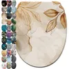 A collage of toilet seat covers with different designs, with one main design prominently displayed. Produktbild-Vorschau