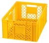 A yellow plastic crate is shown against a white background. Produktbild-Vorschau