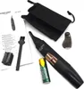 A flat lay of a personal grooming kit, including a trimmer, battery, cleaning brush, and instruction manual. Podgląd zdjęcia produktu