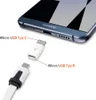 A close-up image showing a USB-C adapter and a Micro USB cable, with a smartphone in the background. Produktbild-Vorschau