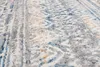 A close-up, angled view of a textured rug with a geometric pattern. Anteprima dell’immagine prodotto