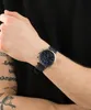 A person's arm wearing a watch. Podgląd zdjęcia produktu