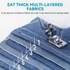 A close-up of a sewing machine foot stitching through multiple layers of denim fabric, with a ruler guide showing measurements. Produktbild-Vorschau