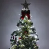 A decorated Christmas tree with lights and ornaments. Anteprima dell’immagine prodotto
