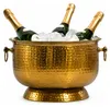 Champagnerkühler Hammerschlag Gold XXL für 6 Flaschen in Gesamtansicht mit drei Champagnerflaschen und Eis gefüllt. Produktbild-Vorschau