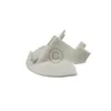 A single white plastic washing machine part, shown from a diagonal angle on a white background. Produktbild-Vorschau