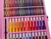 A pink art case filled with crayons and markers. Podgląd zdjęcia produktu