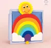 A children's felt book featuring a sun and rainbow. Produktbild-Vorschau