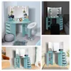 A collage of images showing a light blue vanity table with LED lights and mirrors, in different room settings. Podgląd zdjęcia produktu