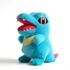 A blue plush toy of a character from the Pokemon franchise, likely Totodile, is shown against a white background. Produktbild-Vorschau