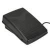 A black sewing machine foot pedal is shown against a white background. Produktbild-Vorschau