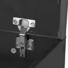 Close-up of a metal hinge attached to a dark-colored surface. Náhled obrázku produktu