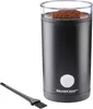 A black electric coffee grinder with a clear lid filled with coffee grounds, shown with a small cleaning brush. Produktbild-Vorschau