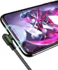 A close-up shot of a phone charging cable plugged into a smartphone displaying a game. Voir les images du produit