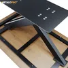 Close-up of a table's metal legs and wooden tabletop. Podgląd zdjęcia produktu